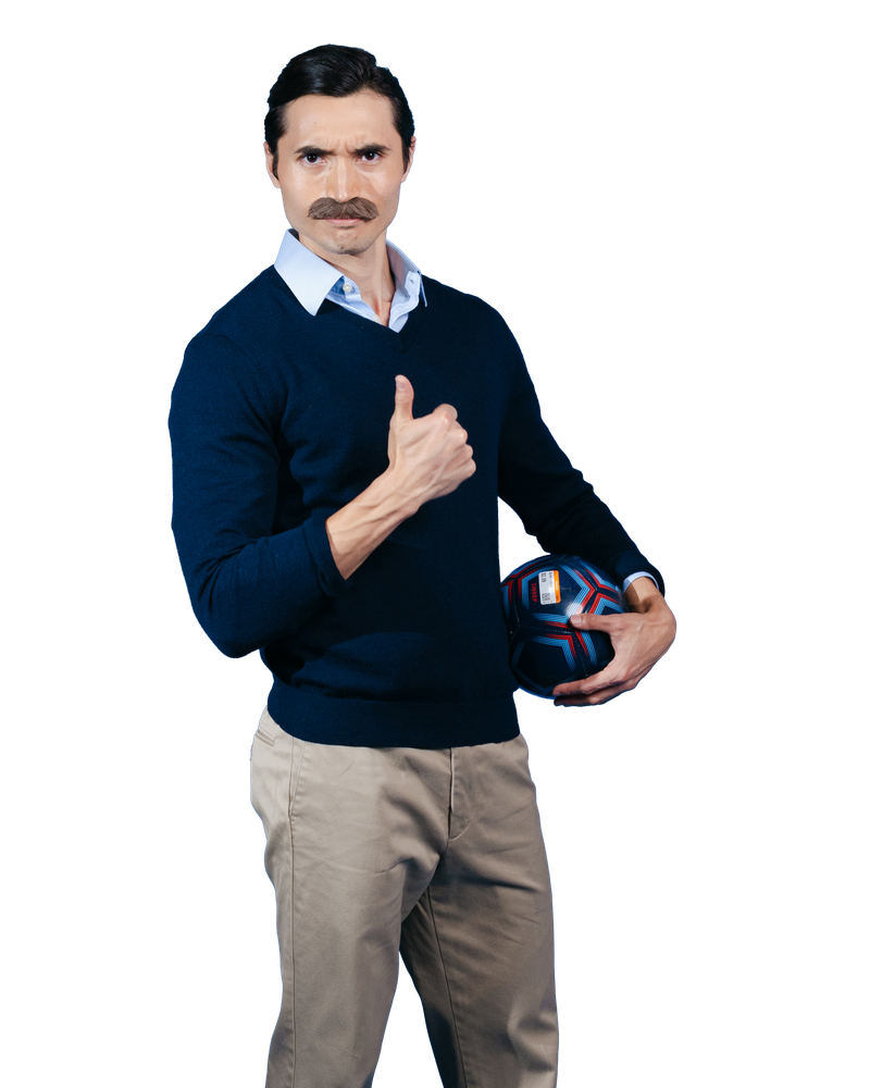 A Coach costume with a navy sweater, collared shirt, khaki trousers and soccer ball.