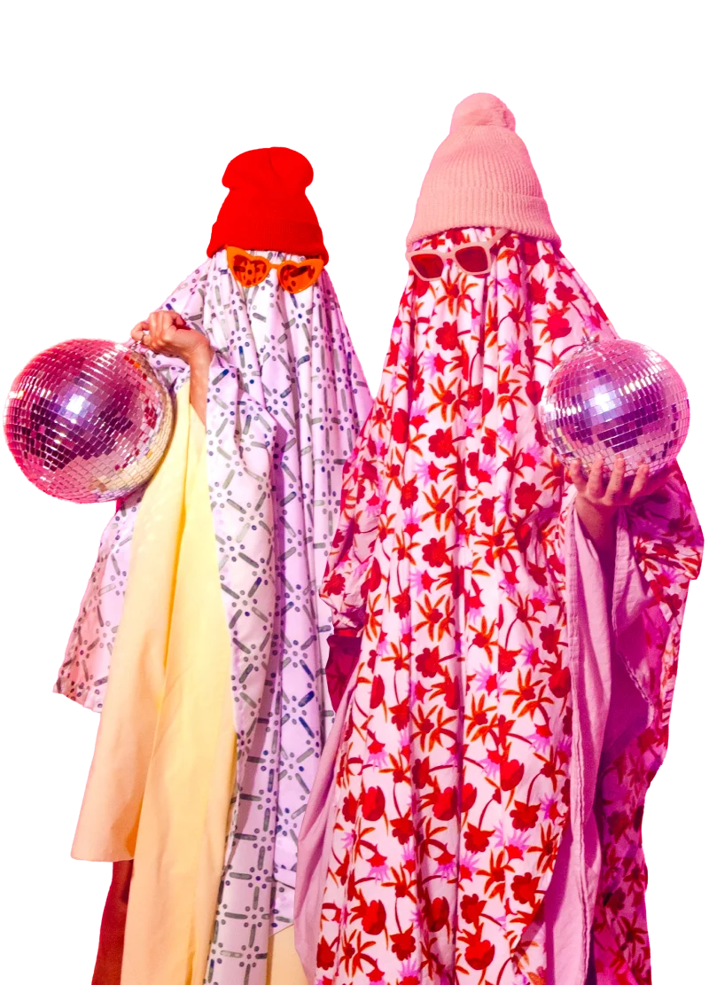 Two sheet ghost costumes with colorful hats, sunglasses and pink disco balls.